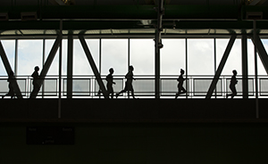 Silhouette of students running